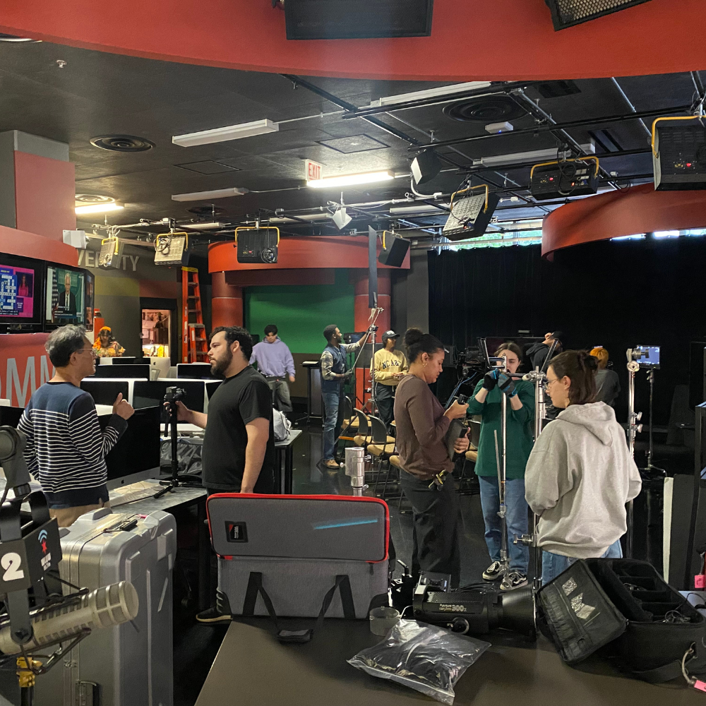 Loyola Chicago college students working production in SOC's studio